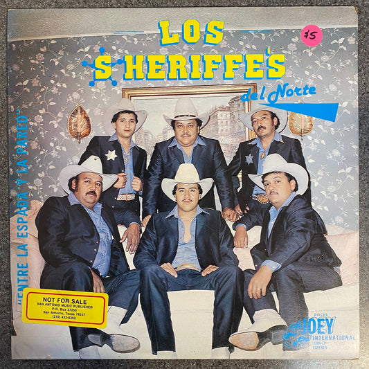 Los Sheriffe's Del Norte - Entre La Espada Y La Pared  (Vinyl)